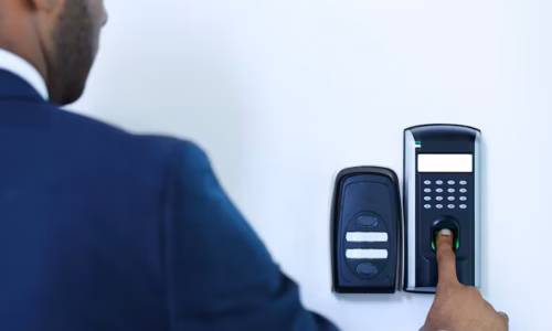 being-security-conscious-cropped-rear-view-young-african-american-businessman-scanning-his-finger-gain-entry-building_590464-31664