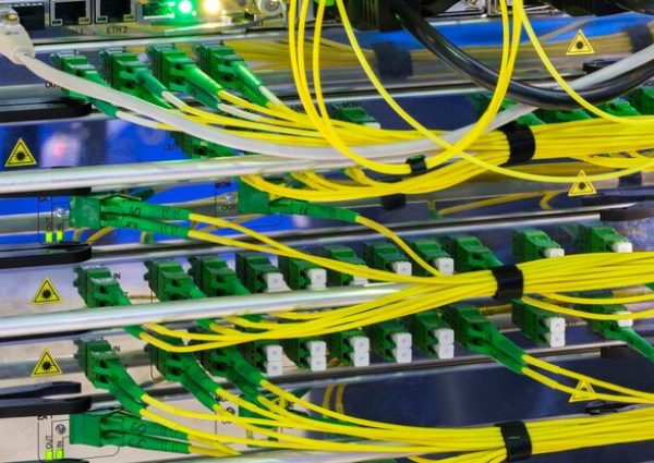 multi-colored-network-cables-connected-switch-network-technology-concept_263512-7063